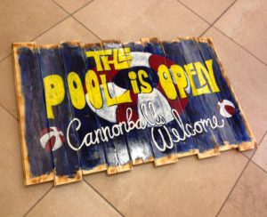 Hand painted reclaimed wood pool sign